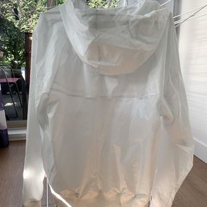 White unisex Nike jacket. Brand new with all labels attached.